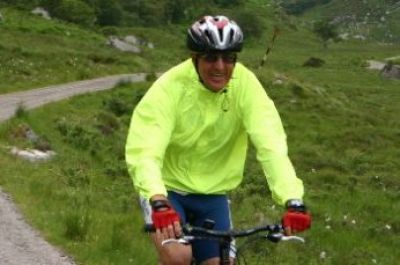 Eric Coull Cycling on the  tour with redspokes